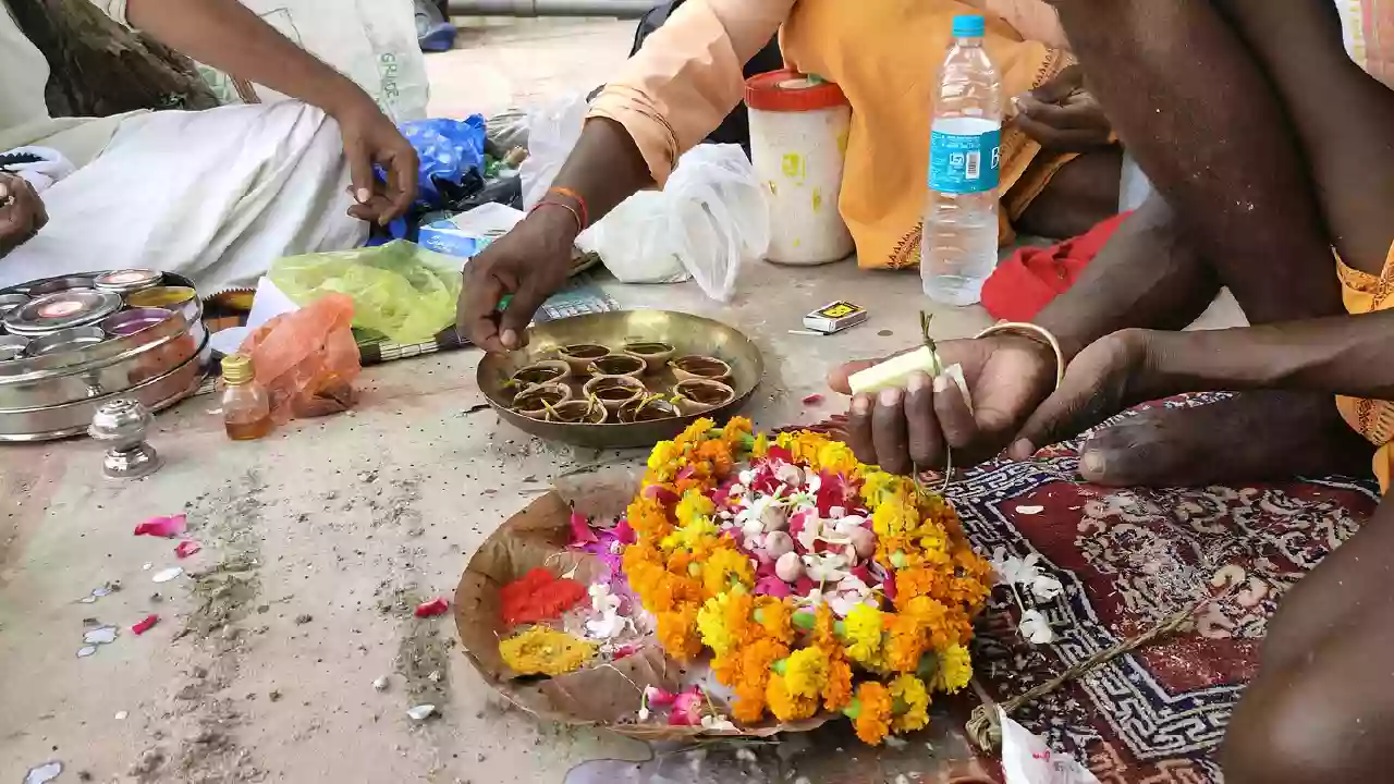 Devotee performing Pind daan - The A to Z of Pitrupaksha